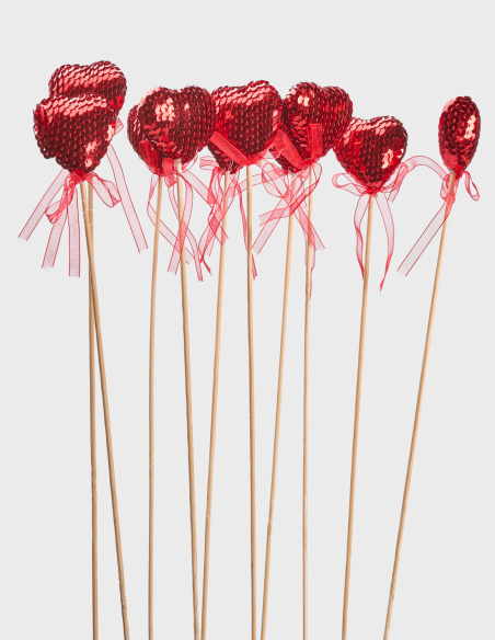Pique coeur décoratif avec paillettes et nœud